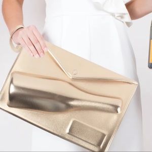 Neiman Marcus Gold clutch
A must have holiday essential